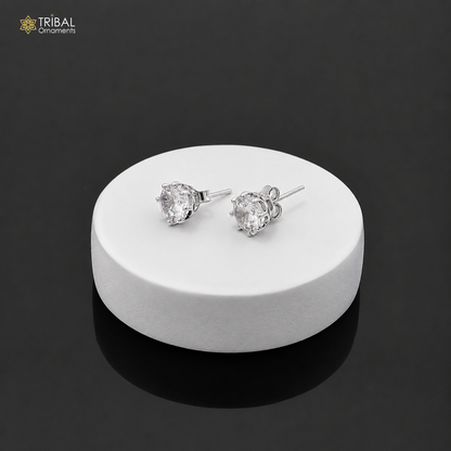925 sterling silver white diamond stud earring with round shape, unisex jewelry by TRIBAL ORNAMENTS, close-up view.