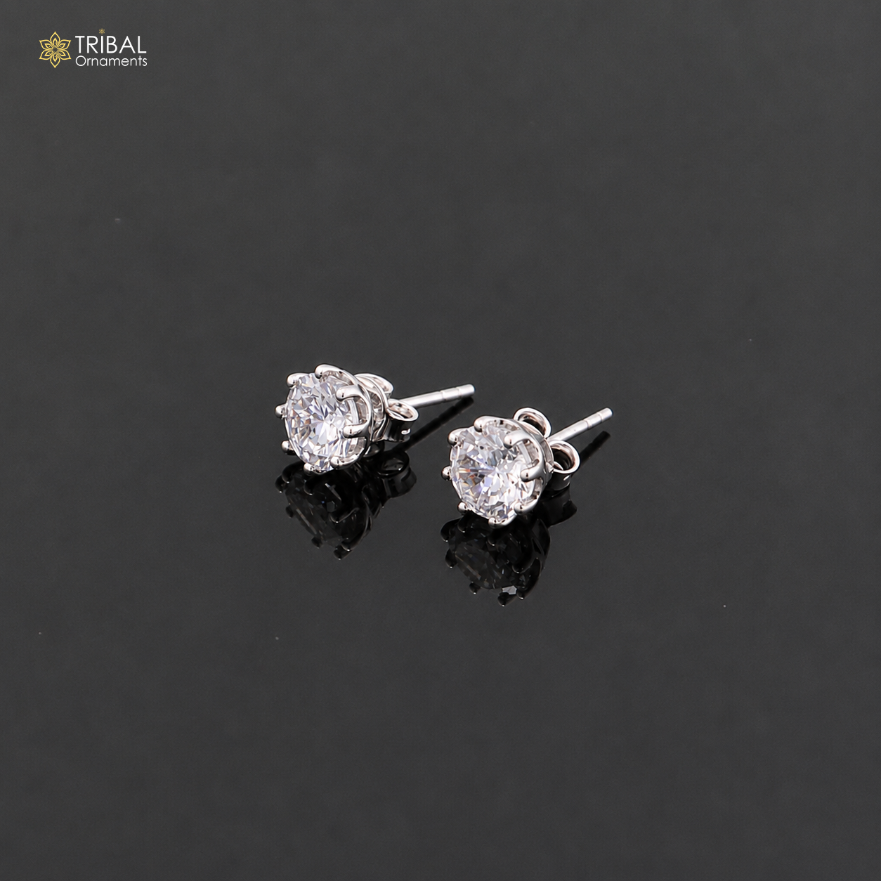 925 silver round white diamond stud earring by TRIBAL ORNAMENTS, showcasing a sparkling white diamond in a sleek round setting.