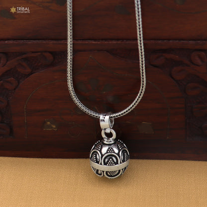 Sterling silver ball design pet cat/dog jingling pendant with tribal jewelry style, featuring intricate details and a shiny finish.
