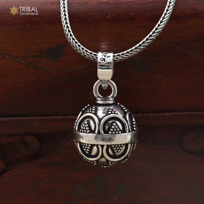 Sterling silver ball design pet cat/dog jingling pendant with tribal jewelry style, featuring intricate craftsmanship and animal motifs