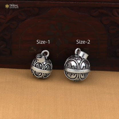 Sterling silver ball design pet cat and dog jingling pendant with tribal ornament details, suitable for jewelry and accessories.