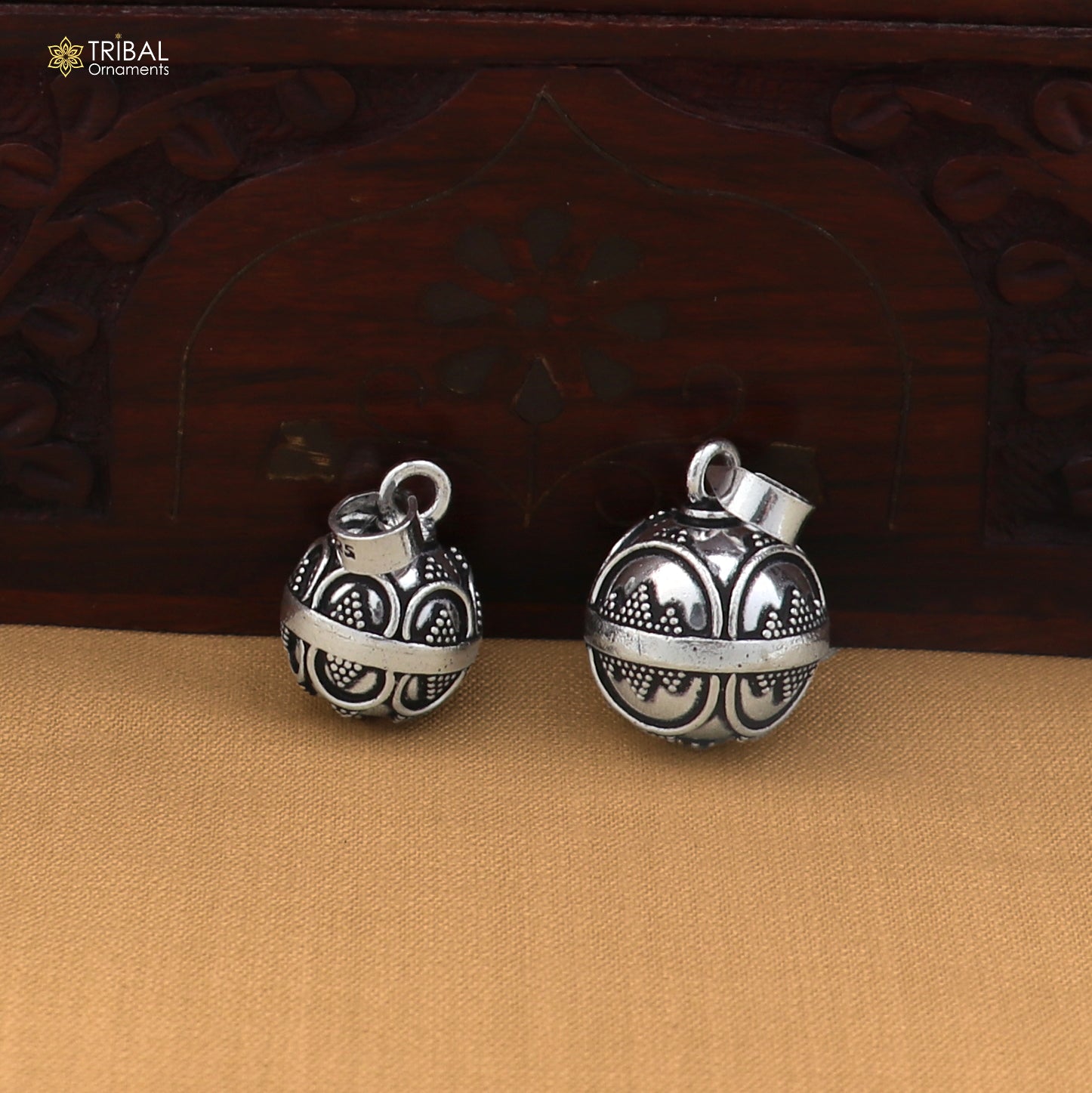 Sterling silver ball pendant with jingling design for cats and dogs, tribal jewelry by TRIBAL ORNAMENTS.