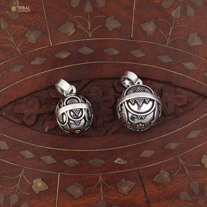 Sterling silver ball design pet cat and dog jingling pendant with tribal jewelry style, featuring intricate detailing and a polished finish.