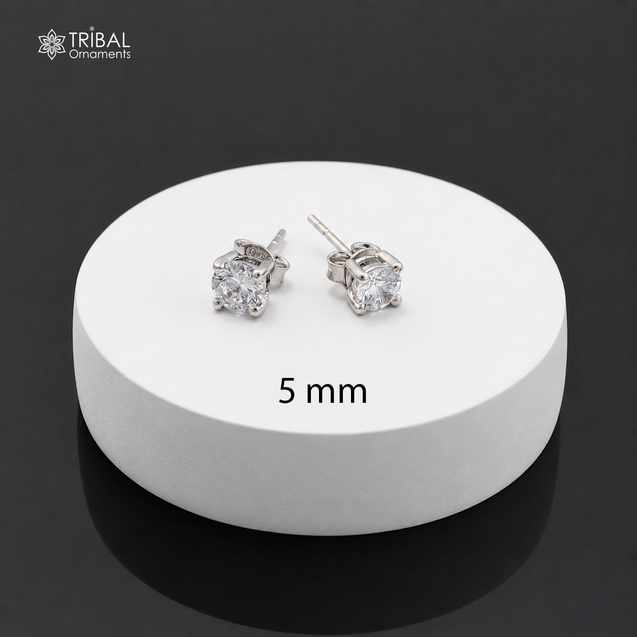 Sterling silver white diamond stud earring with round shape, unisex jewelry, featuring sparkling white diamonds and sleek design.