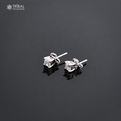 Sterling silver square-shaped white diamond stud earring by TRIBAL ORNAMENTS, unisex jewelry with a polished finish.