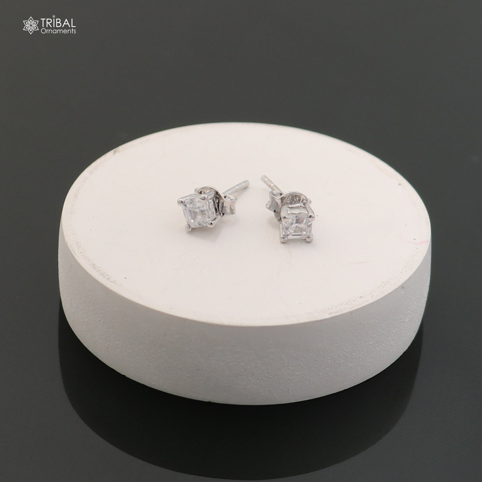 Sterling silver square white diamond stud earring by TRIBAL ORNAMENTS, unisex jewelry with sparkling gemstone setting.