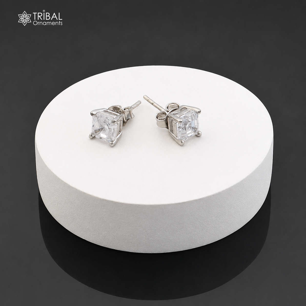 Sterling silver square-shaped white diamond stud earring by Tribal Ornaments, unisex jewelry with a sleek, elegant design.