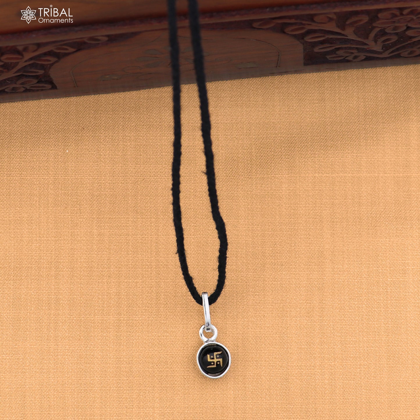 Sterling silver Swastik pendant for girls or kids jewelry, detailed tribal design in 925 silver.