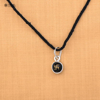 Sterling silver Swastik pendant for girls or kids jewelry, crafted by TRIBAL ORNAMENTS, with intricate design and polished finish.