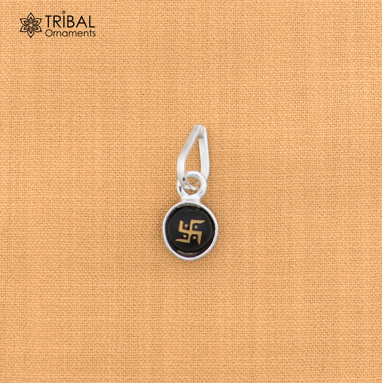 Sterling silver Swastik pendant for girls or kids jewelry, featuring intricate tribal design and craftsmanship.
