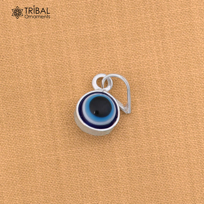 925 sterling silver evil eye pendant for girls and kids, protective jewelry by TRIBAL ORNAMENTS, featuring a blue and silver design.