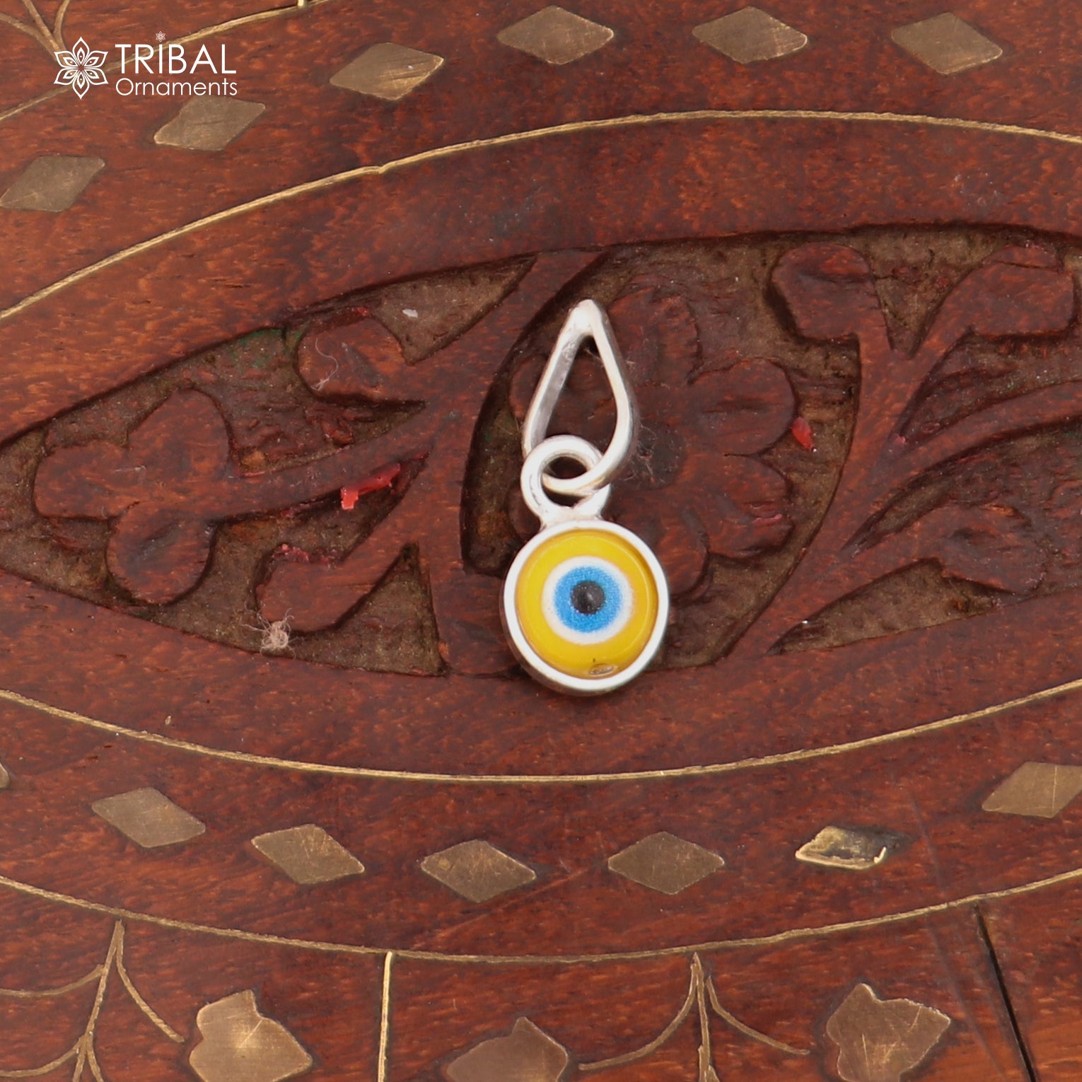 925 sterling silver evil eye pendant for girls or kids, protective jewelry by TRIBAL ORNAMENTS, featuring a blue evil eye design.