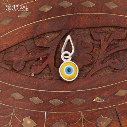 925 sterling silver evil eye pendant for girls or kids, protective jewelry by TRIBAL ORNAMENTS, featuring a blue evil eye design.