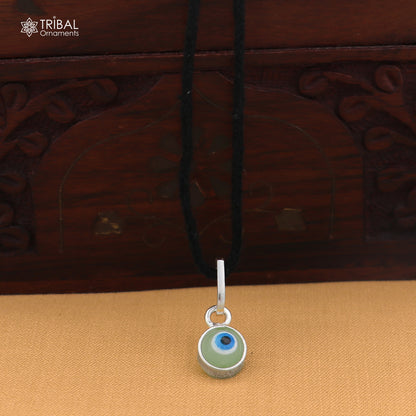 925 sterling silver evil eye pendant for girls and kids, protective jewelry by TRIBAL ORNAMENTS, featuring a vibrant blue eye design.