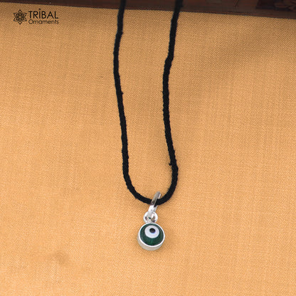925 sterling silver evil eye pendant for girls or kids, protective jewelry by TRIBAL ORNAMENTS, featuring a blue evil eye design.