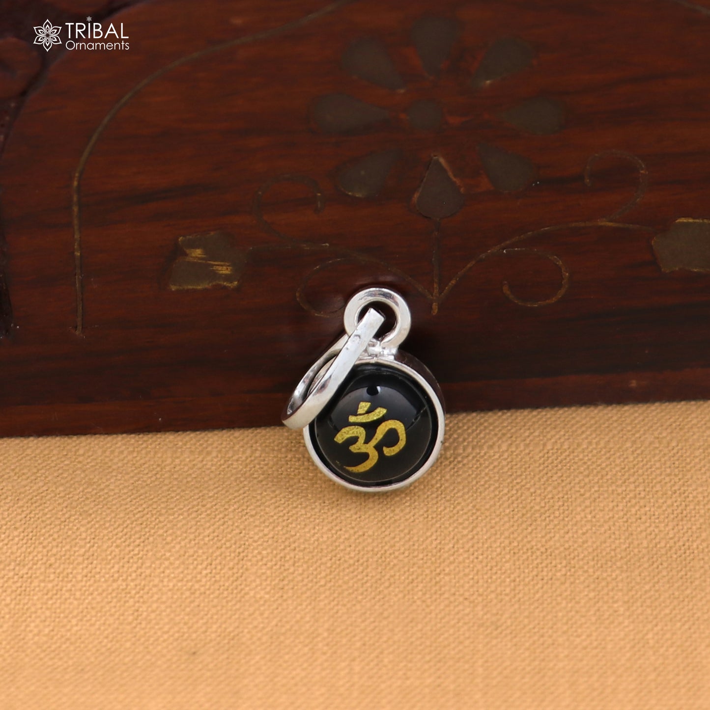 925 sterling silver Om pendant for girls and kids, featuring protective design, from TRIBAL ORNAMENTS.