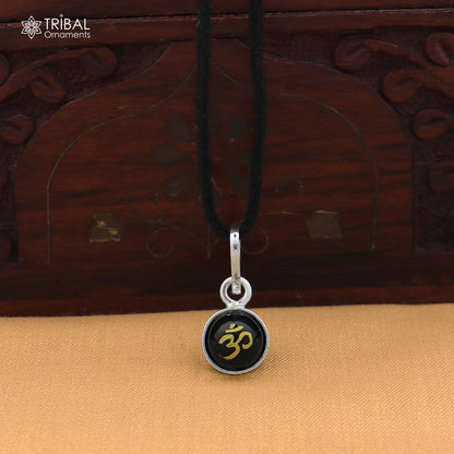 Sterling silver OM pendant for girls or kids, protective jewelry by TRIBAL ORNAMENTS, featuring a detailed Om design.