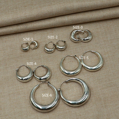 Sterling silver plain hoop earring in various sizes, Bali tribal jewelry style by TRIBAL ORNAMENTS, shown on a white background.