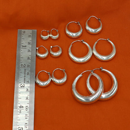 Sterling silver plain hoop earring by TRIBAL ORNAMENTS, Bali tribal jewelry, available in all sizes, showcasing a smooth, polished finish.