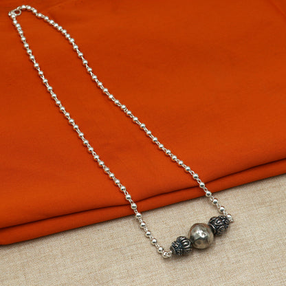 Sterling silver handmade 4mm bead necklace with a unique ball pendant, traditional tribal jewelry by TRIBAL ORNAMENTS.