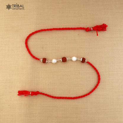 925 sterling silver RUDRAKSHA and pearl beads Rakhi bracelet with red thread, handcrafted by TRIBAL ORNAMENTS.