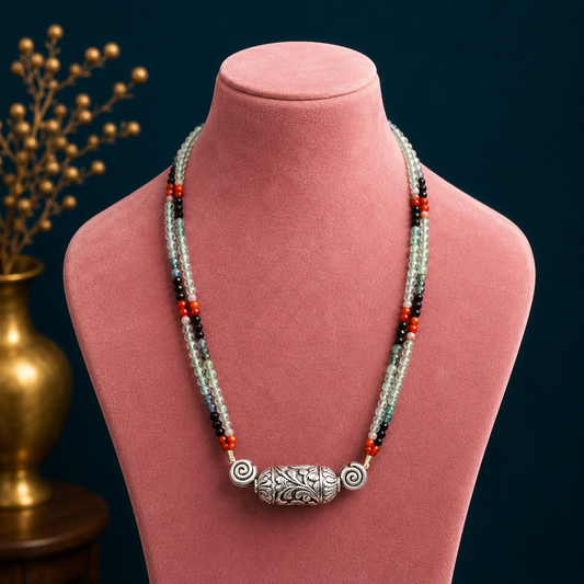 Indian traditional beaded sterling silver necklace and choker set with tribal nakshi work and natural stone accents.