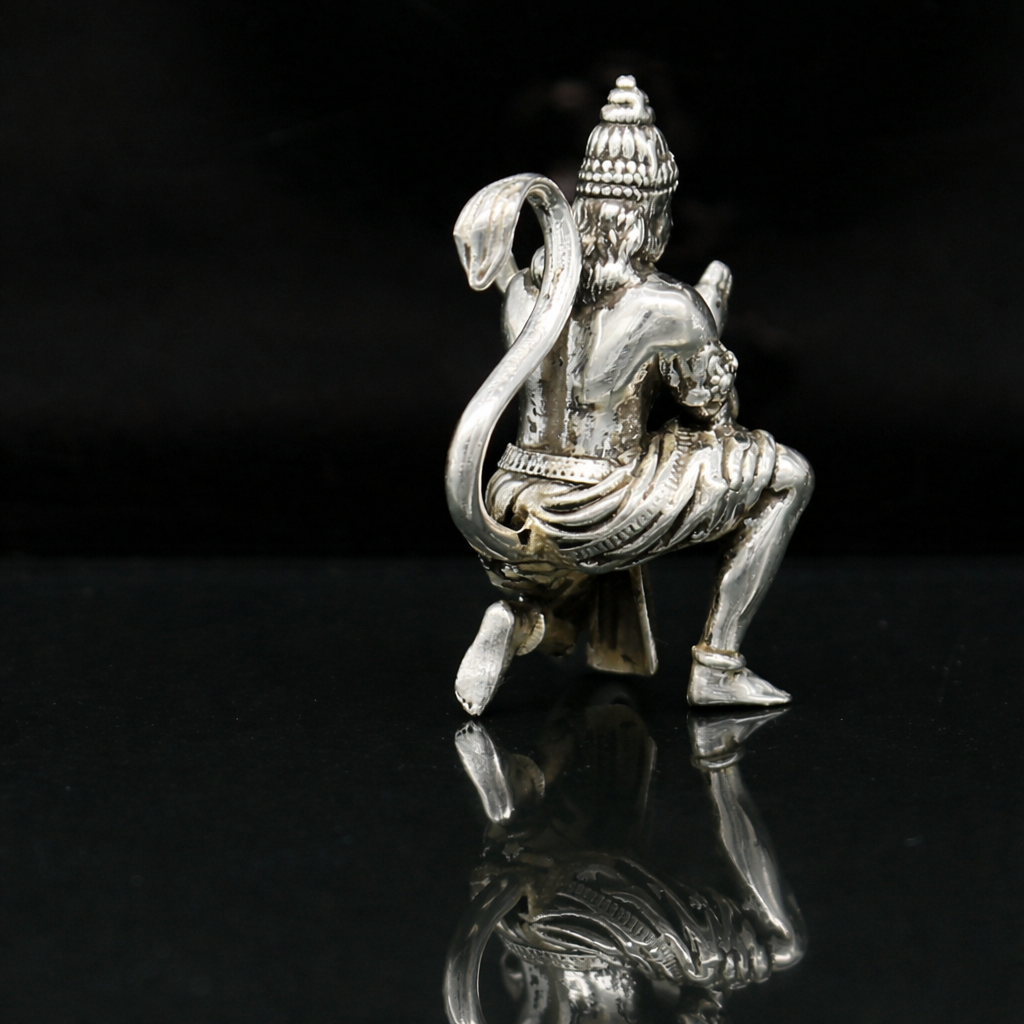Mini 925 silver Hanuman idol by TRIBAL ORNAMENTS, suitable for puja or car dashboard decor, featuring detailed Bajrangbali design.