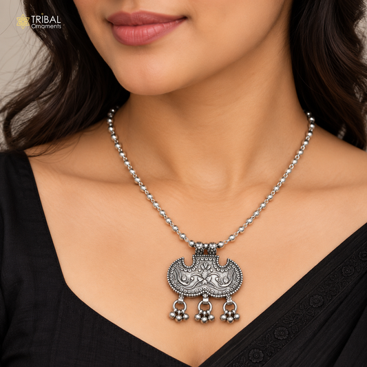 Vintage tribal silver peacock necklace featuring beaded chain and traditional sterling silver pendant, stylish choker jewelry set.