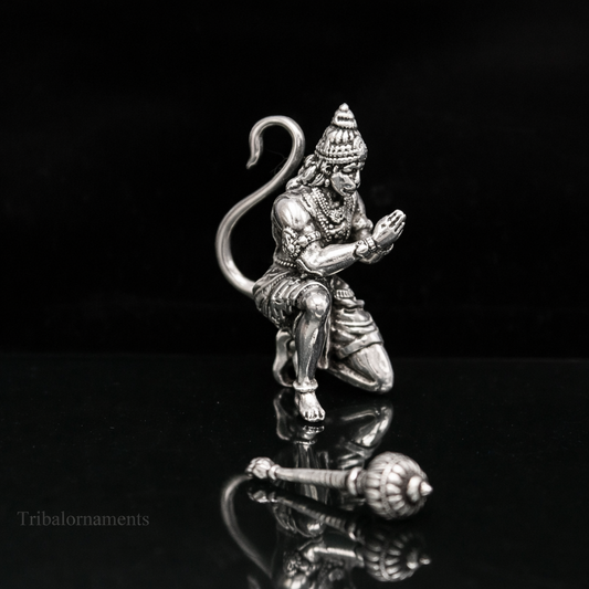 925 silver Hanuman idol miniature for puja and car dashboard decor by TRIBAL ORNAMENTS, featuring a detailed black background.
