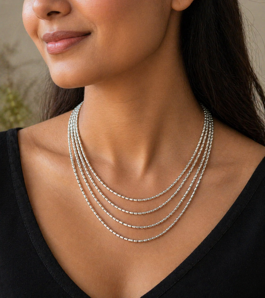 Sterling silver 4-line beaded chain necklace set by TRIBAL ORNAMENTS, featuring intricate tribal-inspired beaded jewelry design