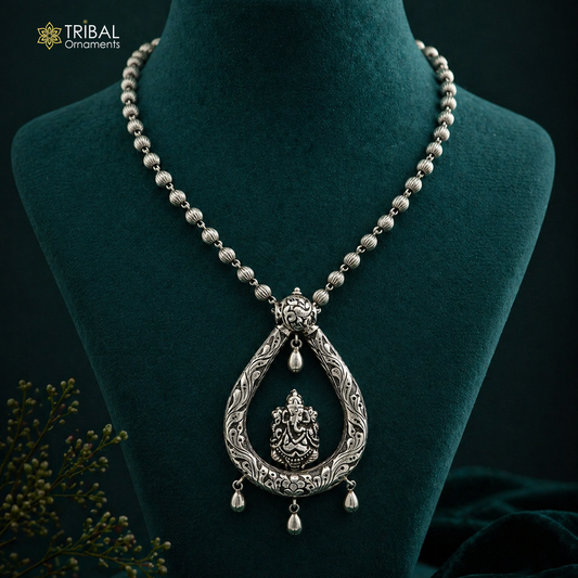Sterling silver Ganesha pendant with beaded tribal necklace, traditional Indian ethnic jewelry set with intricate design details.