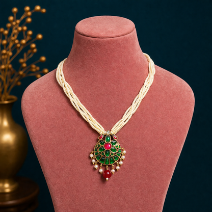Sterling silver India kundan pendant with peacock design, surrounded by multiline pearl strings, part of TRIBAL ORNAMENTS jewelry set.