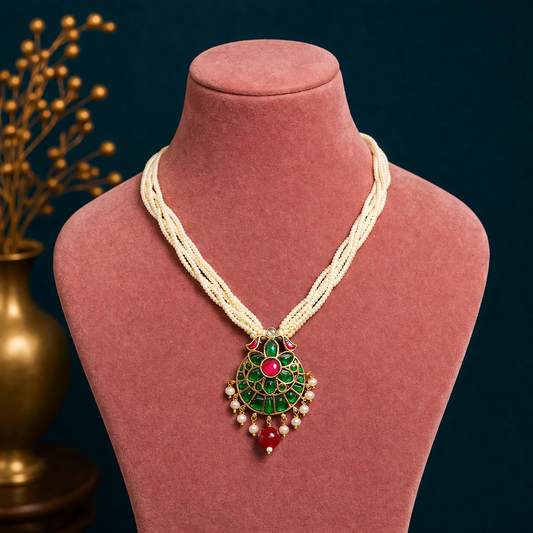 Sterling silver India kundan pendant with peacock design, surrounded by multiline pearl strings, part of TRIBAL ORNAMENTS jewelry set.