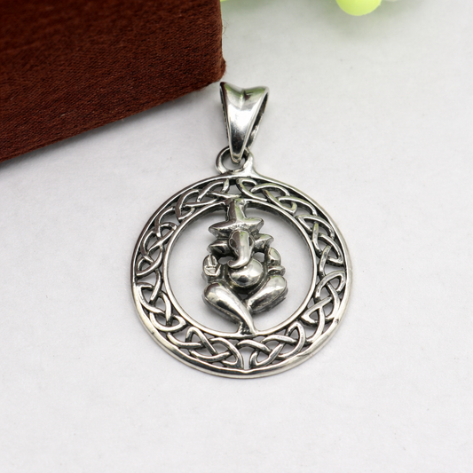 Sterling silver Lord Ganesha pendant with intricate design, unisex jewelry piece by TRIBAL ORNAMENTS, perfect for gifting