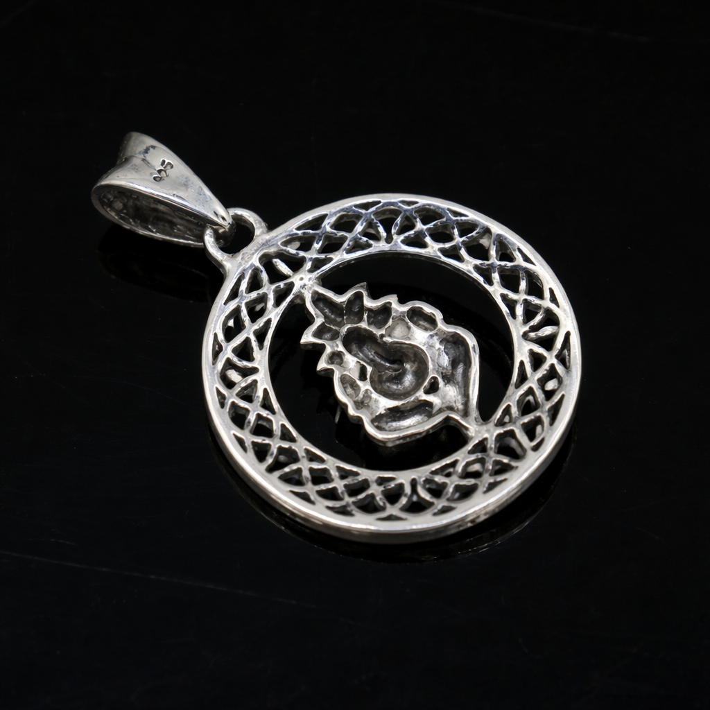 Sterling silver Lord Ganesha pendant with intricate design, unisex jewelry piece, perfect for gifting by Tribal Ornaments.