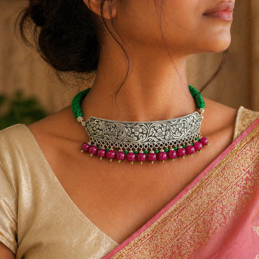 Sterling silver Nakshi work charm necklace choker featuring tribal ethnic design inspired by Rajasthan's rich cultural heritage.