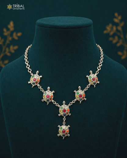 Sterling silver Navratan stone tortoise necklace with tribal design, traditional ethnic jewelry for belly dance or special occasions.