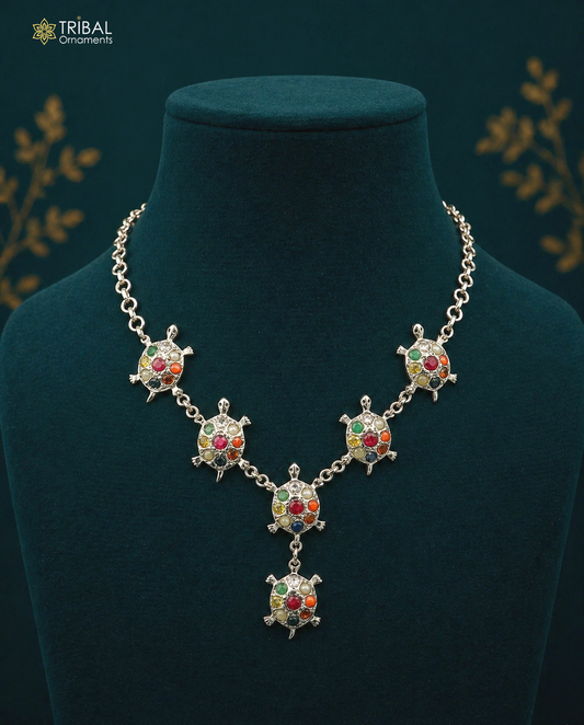 Sterling silver Navratan stone tortoise necklace with tribal design, traditional ethnic jewelry for belly dance or special occasions.