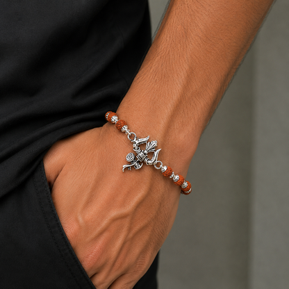 Sterling silver Rudraksha beaded bracelet featuring Lord Shiva's trident design, crafted by TRIBAL ORNAMENTS.