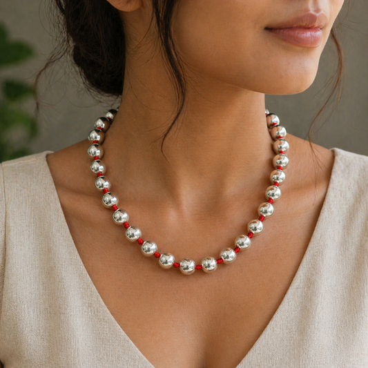 Sterling silver beaded necklace with round beads, vintage style, ethnic-inspired jewelry, stylish and unique wedding charm necklace.