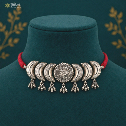Sterling silver flower design ethnic charm necklace from TRIBAL ORNAMENTS, featuring intricate tribal jewelry style and floral details.