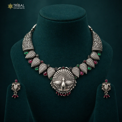 Sterling silver handmade peacock belly dance necklace with adjustable chain, featuring intricate feathers and traditional tribal design.