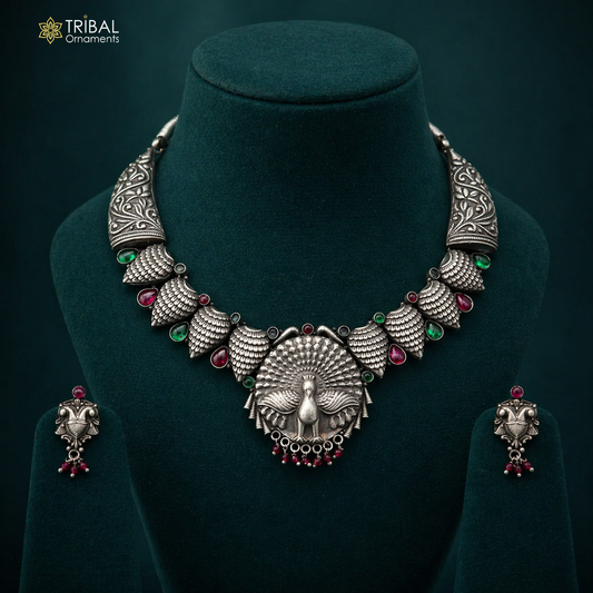 Sterling silver handmade peacock belly dance necklace with adjustable chain, featuring intricate feathers and traditional tribal design.