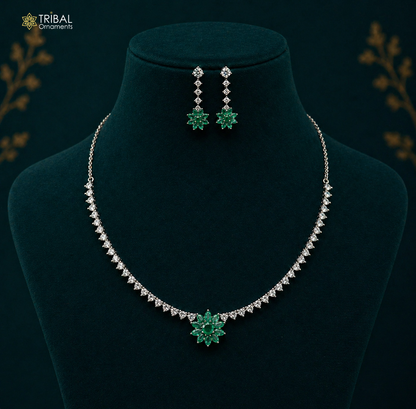 Sterling silver necklace with green cubic zirconia stones, handcrafted tribal design, ideal for weddings and special occasions.