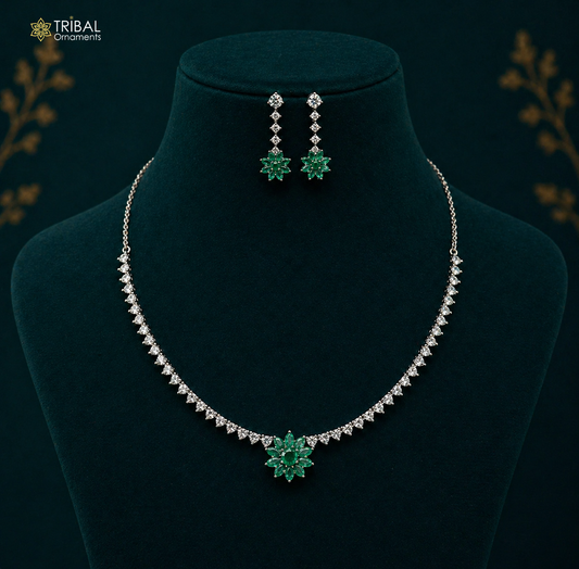 Sterling silver necklace with green cubic zirconia stones, handcrafted tribal design, ideal for weddings and special occasions.