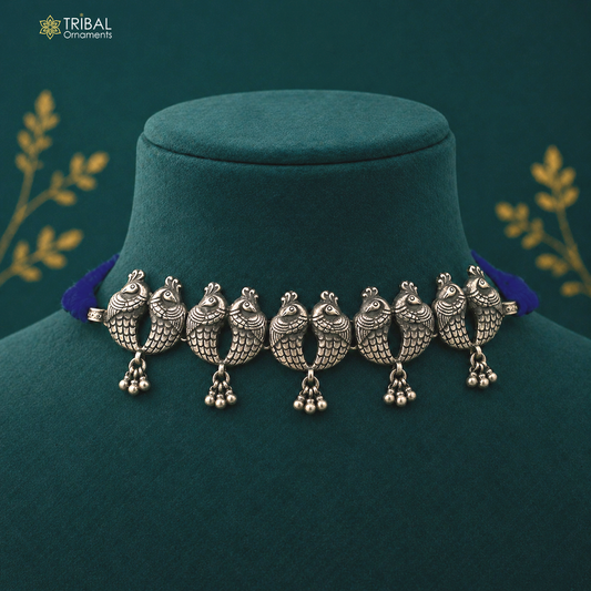 Sterling silver peacock design ethnic charm necklace and tribal jewelry set featuring handcrafted tribal ornaments.