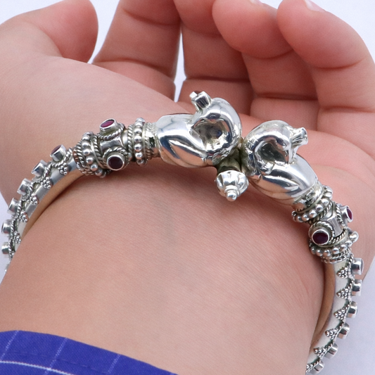 Sterling silver tribal belly dance bangle bracelet with peacock design and cubic zircon stones, crafted by Tribal Ornaments.