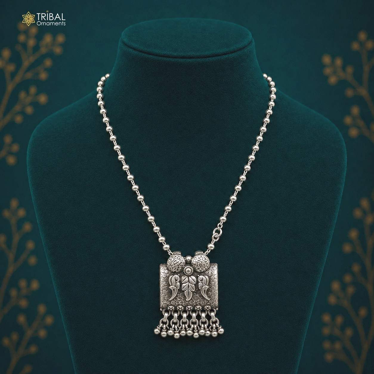 Sterling silver bird pendant with beaded necklace by TRIBAL ORNAMENTS, handcrafted tribal jewelry, ideal for boho and casual outfits.