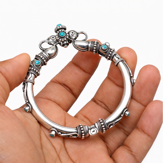 Sterling silver vintage peacock bangle bracelet with intricate ethnic details, ideal for traditional belly dance jewelry.