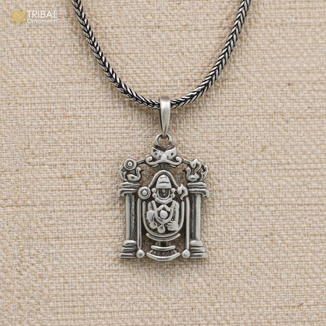 Sterling silver Tirupati Bala Ji pendant with chain, tribal jewelry featuring detailed religious deity design.